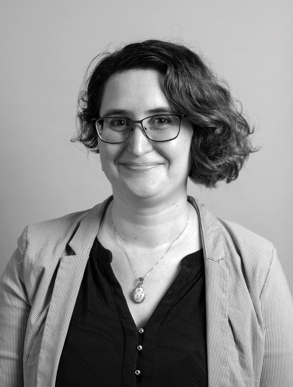 A black and white photo of Lara.